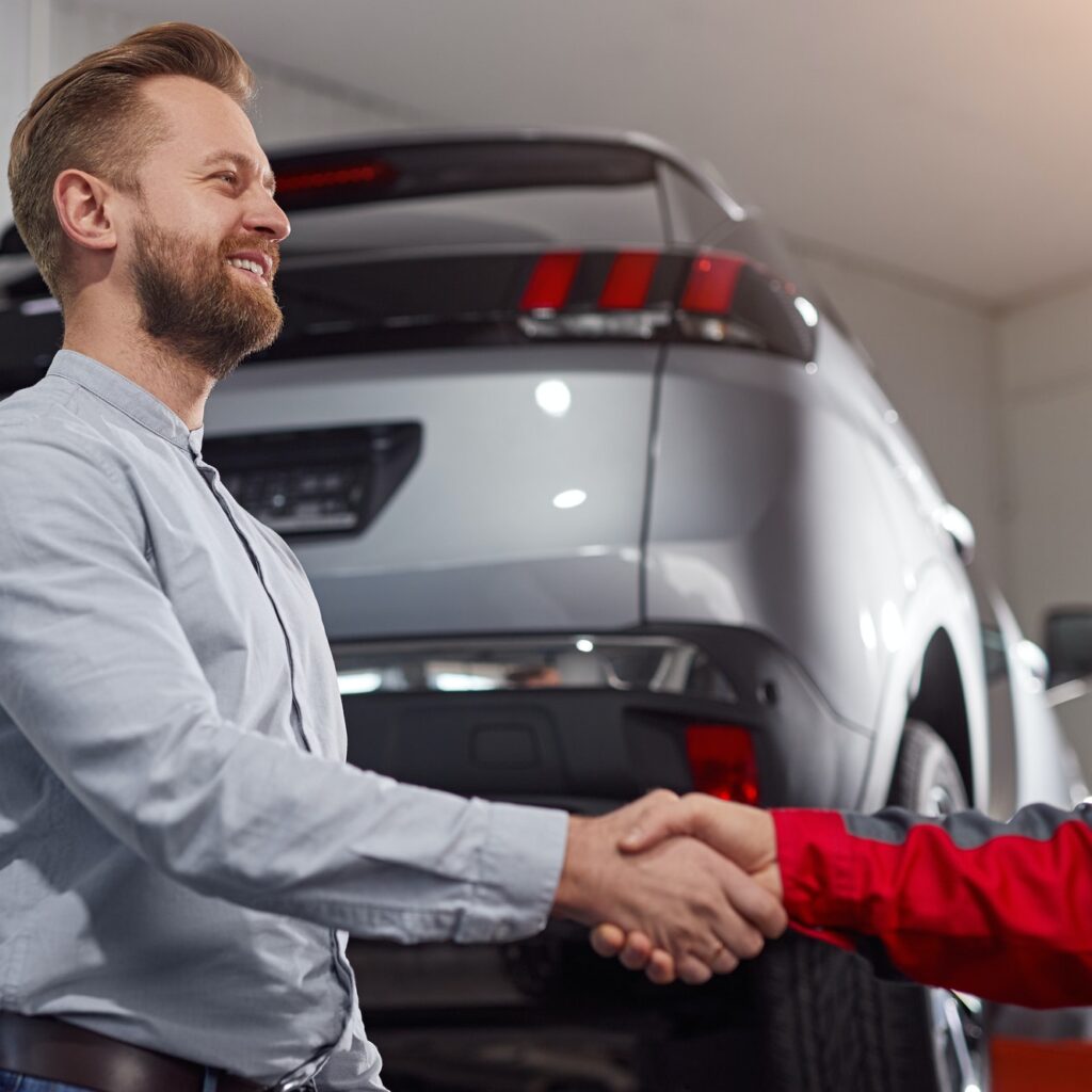 Client and mechanic in car service