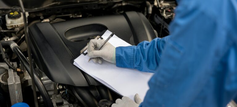 Mechanic repairing car